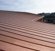 Rézlemez helyett rézhatású festékkel ellátott vízszigetelés Rézlemez helyett rézhatású festékkel ellátott vízszigetelés