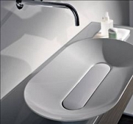 Szokatlan forma- és színvilág a fürdőszobában Szokatlan forma- és színvilág a fürdőszobában